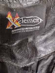 lot 76 image: Pair of X Element Black Leather Motorcycle Chaps with a 28-inch Inseam