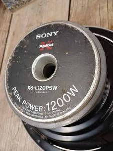 lot 85 image: Sony XPLOD 1200 Watt Peak Power Speaker - 12.75-inch Radius, and a Chrysler 6.75-inch Radius Speaker