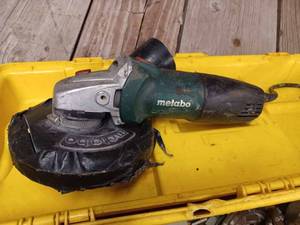 lot 106 image: Two Metabo Angle GrinderSanders (Second Metabo Did not show up in Picture but is nearly identical)
