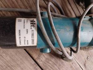 lot 111 image: IIT 4.5-inch Electric Angle Grinder with Wire Brush, and Black & Decker Electric Finishing Sander