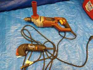 lot 114 image: Ryobi Electric Circular Saw, Chicago Electric Double Fisted Half-Inch Electric Drill, and a Dremel Variable Speed Sander