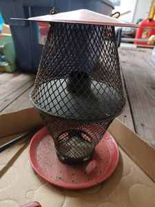 lot 134 image: Ornate Metal Lawn Sprinkler, Pruning Shear, and What Appears to be a Lantern-Shaped Wire Bird Feeder