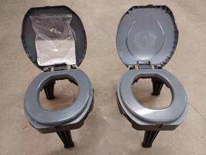 lot 148 image: Two Reliance Fold-To-Go Camping Toilets