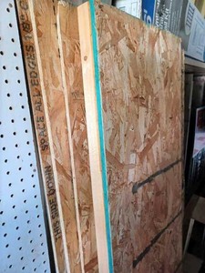 lot 158 image: 2-Pieces of Peg Board, 6 - Pieces of Chip Board with 2 X 4 Framing on one side