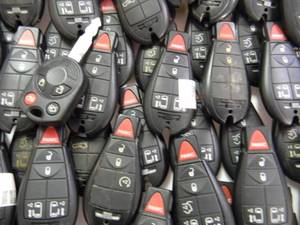 APPROX 75 Chrysler - Dodge Key Fobs - USED FOBS - GREAT COLLECTION - SEE PICTURES