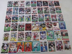 lot 40 image: 54 Assorted Football Cards - See Al...