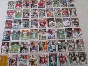 lot 41 image: 54 Assorted Football Cards - See Al...