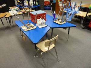 lot 145 image: Room 171 Blue Trapezoid Tables & Chairs