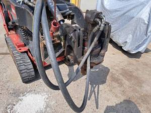 lot 12 image: Toro Dingo Auger Attachment