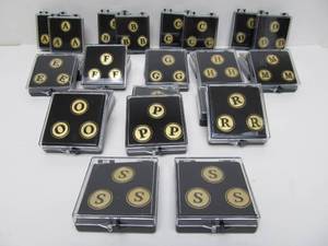 lot 124 image: Large Lot of Metal Letter Golf Ball Markers