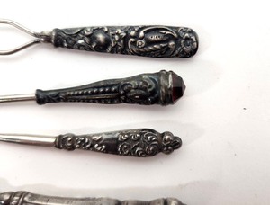 lot 241 image: Group of Antique Sterling Silver Sewing Tools