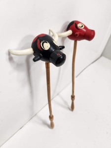 lot 287 image: Very Cool Extra Long 1950s Barbecue Bull Salt & Pepper Shaker Set