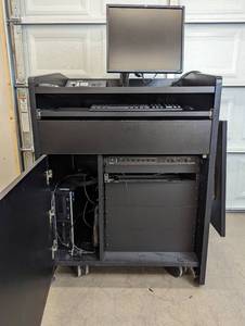 lot 14 image: Presentation Podium on Wheels With Equipment -  Exetron Tuner & Switch, HP PC