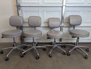 lot 23 image: Set of 4 Rolling Dr. Office Chairs - See Pictures