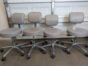 lot 24 image: Set of 4 Rolling Dr. Office Chairs - See Pictures