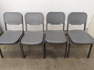 lot 31 image: 4 Stackable Chairs - See Pictures