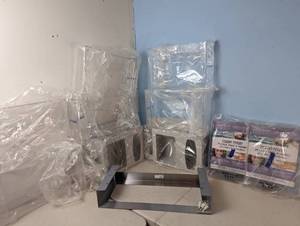 lot 125 image: Wall Mounted Mask Holder Combo - See Pictures