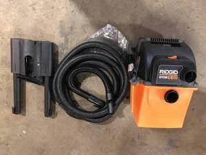 RIDGID  5 Gal. 5.0 Peak HP Portable Wall-Mountable WetDry Shop Vacuum with LED Lighted Car Nozzle and Premium Car Cleaning Kit Customer Returns See Pictures