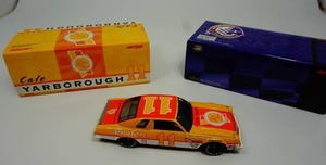 lot 16 image: 1976 Cale Yarborough #11 Holly Farms Laguna S-3. Winner of 9 cup races in 76, and the 1st of his 3 consecutive Cup Champions.