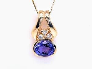 Oval Tanzanite & Diamond Sideways East-West Bezel Three-Stone Pendant in 14k Yellow Gold