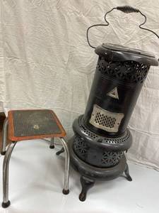 ANTIQUE OIL HEATER AND MILKING STOO...