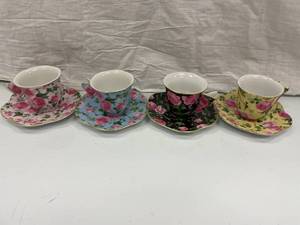 SET OF 4 MINI TEA CUPS & SAUCERS...