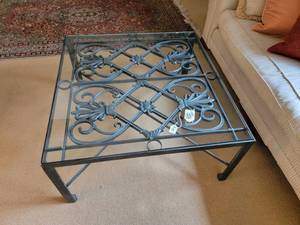Ornate Glass top Iron base Coffee Table.