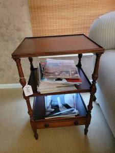 Antique 3 tiered side table by Smith and Watson New York.