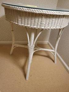 Vintage white round top wicker table. Excellent condition.