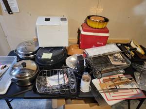 Table full of Kitchen items.
