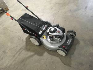 lot 12 image: Murray  21 in. 140 cc Briggs and Stratton Walk Behind Gas Push Lawn Mower with Height Adjustment and with Mulch Bag  Customer Returns See Pictures