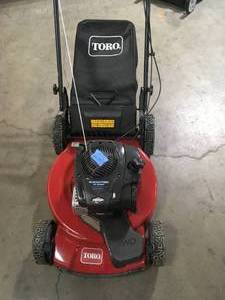 lot 14 image: Toro  22 in. Recycler Briggs & Stratton High Wheel FWD Gas Walk Behind Self Propelled Lawn Mower with Super Bagger  Customer Returns See Pictures