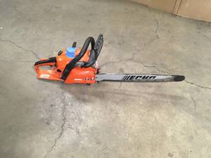 lot 18 image: ECHO  20 in. 50.2 cc Gas 2-Stroke Cycle Chainsaw  Customer Returns See Pictures