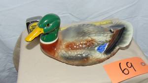 lot 69 image: Ceramic Duck Liqour Bottle 185 Ballantines 1969