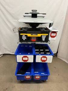lot 31 image: Ergotron Mobile Standing Desk with Built-in Item Supply Storage Holders