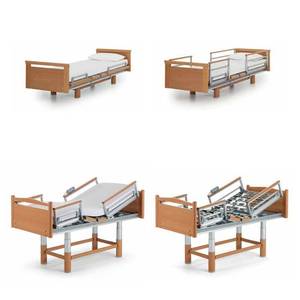 lot 16 image: MSRP $7000 German Design Volker Electric Height Adjustable Bed WChair Position, Hand Remote, Tuck Under Rails &ampamp Electric Hideaway Wheels Plus Microstimulation System Great Working Condition No Reserve See Youtube For More Info