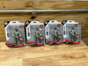 lot 63 image: DISNEY Lot of 4 Luke Skywalker Action Figures