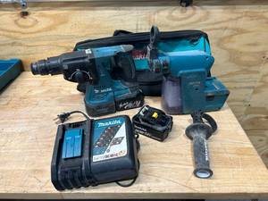 lot 82 image: MAKITA XRH01 Hammer Drill with DX01 HEPA Filter, Charger and 2 Batteries