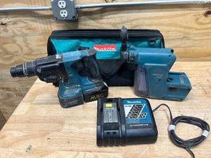 lot 84 image: MAKITA XRH01 Hammer Drill with DX01 HEPA Filter, Bag, Charger and 1 Battery