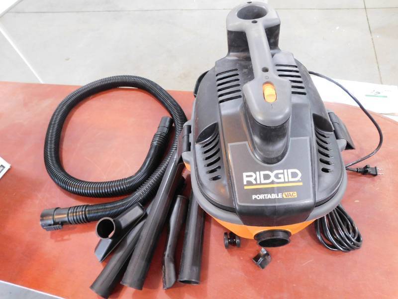 lot 117 image: RIDGID  4 Gallon 5.0 Peak HP Portable WetDry Shop Vacuum with Fine Dust Filter, Locking Hose and Accessories
