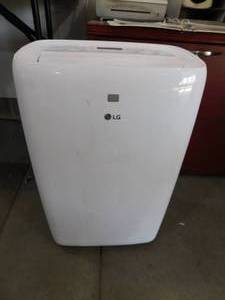 lot 47 image: LG 7,000 BTU (DOE) 115-Volt Portable Air Conditioner LP0721WSR Cools 300 Sq. Ft. with Dehumidifier Function