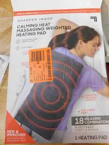 lot 92 image: New - CALMING HEAT 12 in. x 24 in. Massaging Weighted Heating Pad