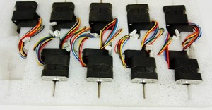lot 35 image: Nine 12 Volt US DIGITAL Small Motors  E5-1000-197-1E-S-D-D-B