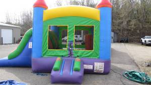 lot 4 image: Moonwalk Slide 19 x 12 Inflatable With Blower Fan