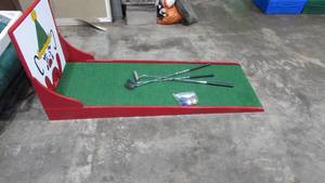 lot 31 image: Putting Game With (3) Putters and Bag of Golf Balls