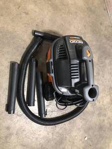 lot 49 image: RIDGID  4 Gallon 5.0 Peak HP Portable WetDry Shop Vacuum with Fine Dust Filter, Locking Hose and Accessories  Customer Returns See Pictures