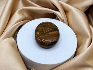 lot 135 image: NEW - Tumbled Tiger Iron Gemstone (Example Pictured - Stone May Have Slight Variations)