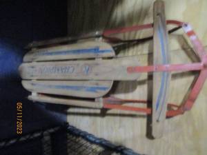 lot 462 image: Vintage metal and wood Champion sno...