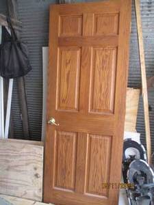lot 409 image: Solid wood interior door with handl...
