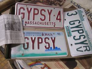 lot 528 image: Gypsy License Plates and News Paper...